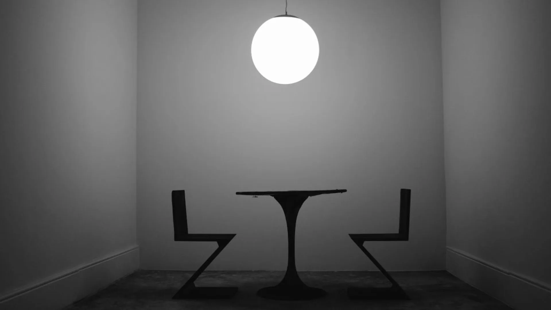 Scale study models of furniture on a white studio table