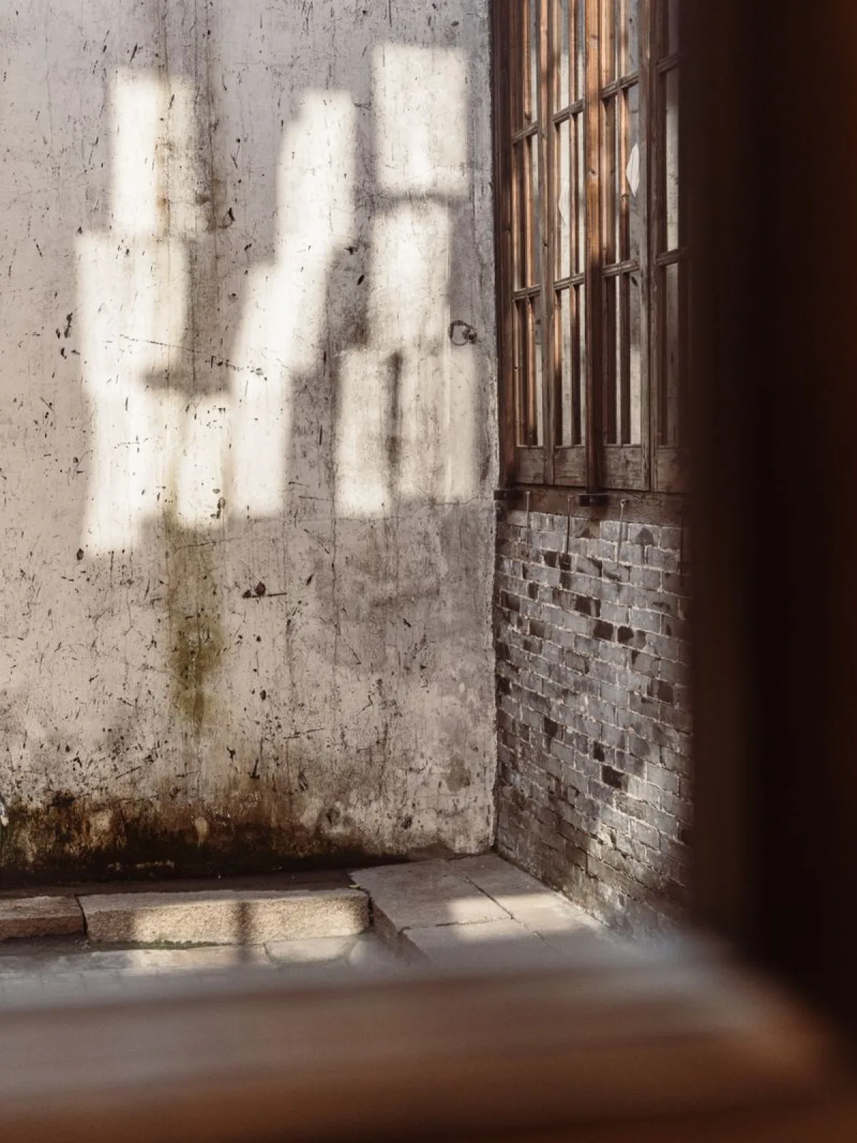 Independent furniture workshop with timber stacks and half-finished frames